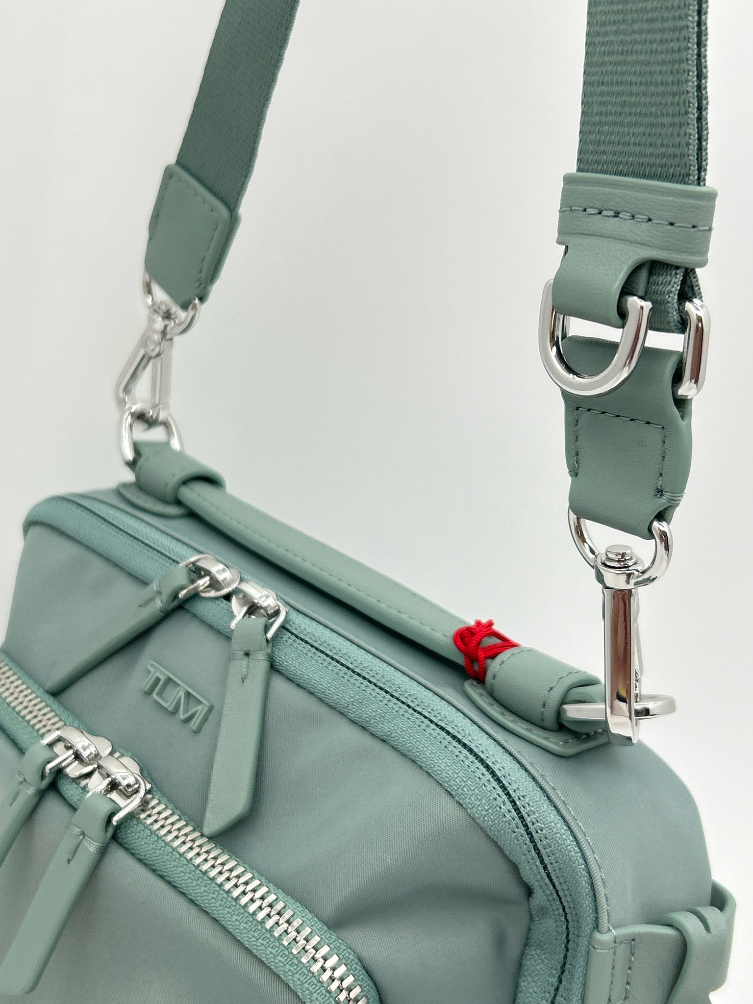 TUMI Light Blue Green Women Purse NWT