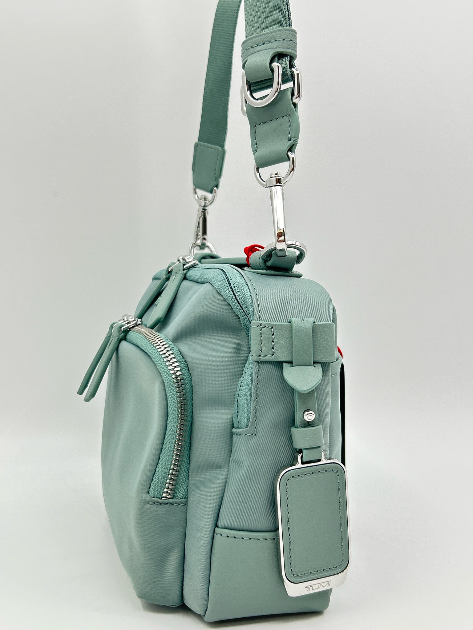 TUMI Light Blue Green Women Purse NWT
