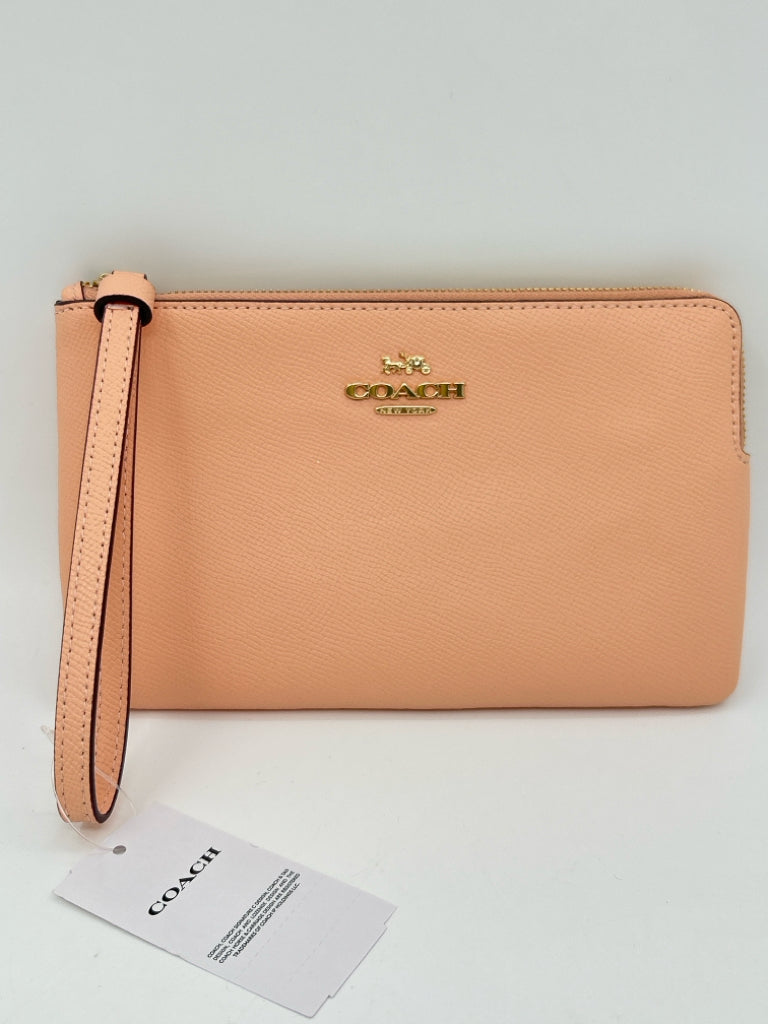 COACH Peach Women's Wristlet