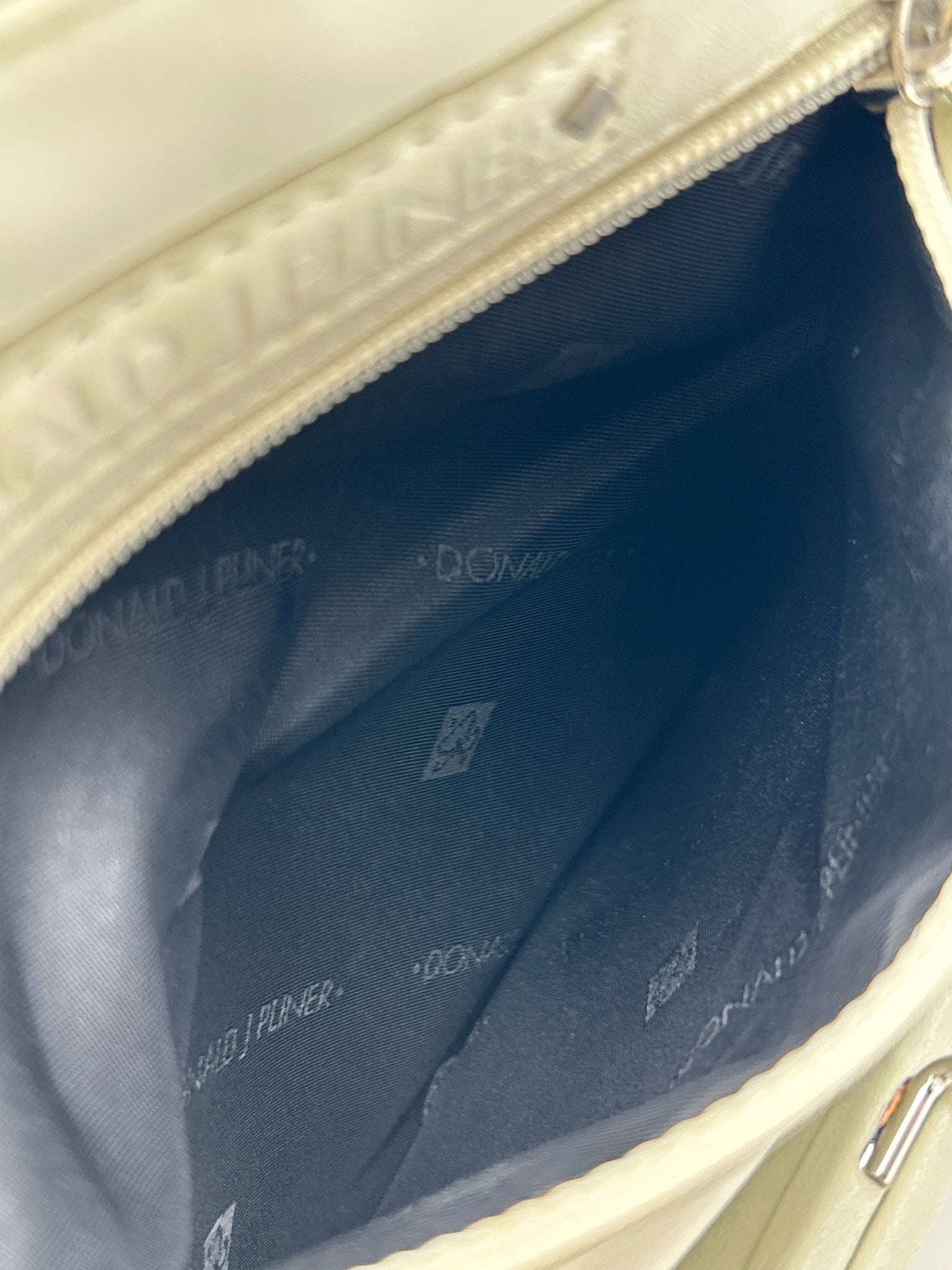 Donald J Pliner Cream & Silver Women Wristlet